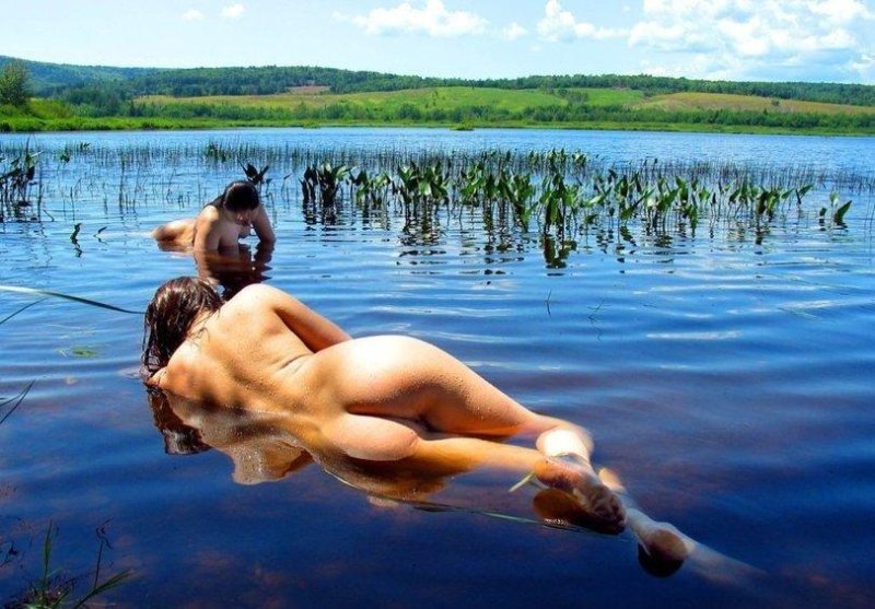 Naked girls on the pond, Naked women on the shore of lake, Naked girls on the lake