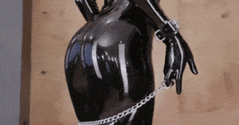 Erotic butt in latex, Girl in a latex suit, Black latex costume