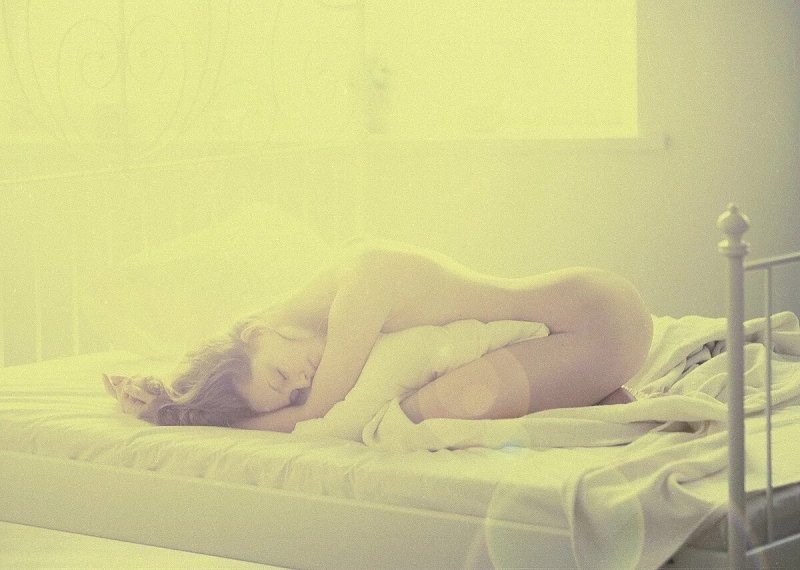 Erotic photos early in the morning, Morning erotica, The girl lies on bed