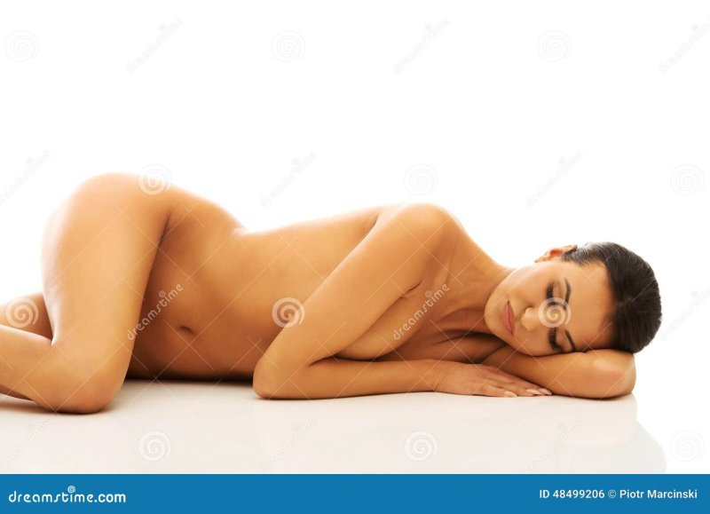 Woman lying naked on stomach sauna, Naked woman lies on top of the stock, Naked woman