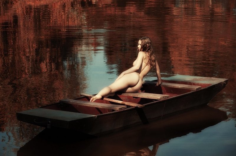 Erotic photo shoot on a boat, Girl in a boat, Naked in a boat