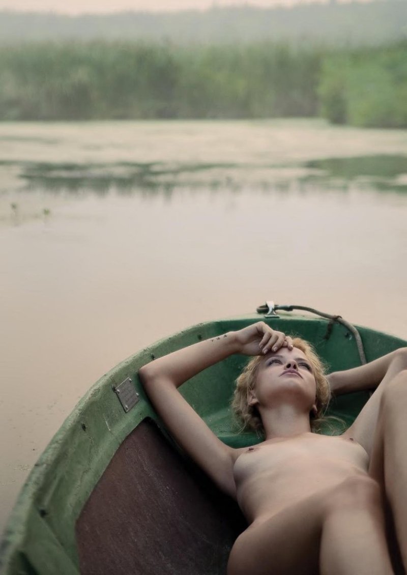 Erotic photo shoot on a boat, Erotic, The girl is in a boat
