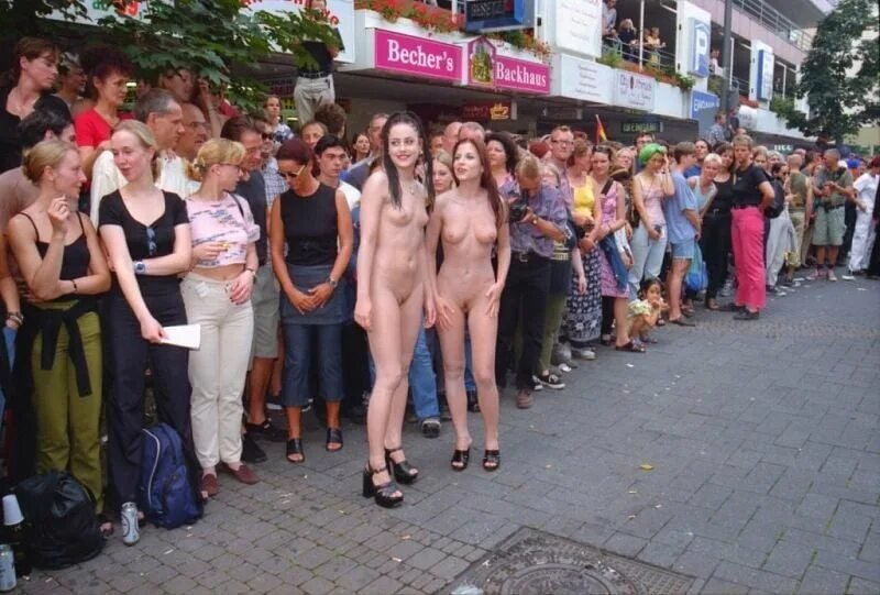 Girls raise dresses naked crowd, Public expression, Clothed female naked on the street