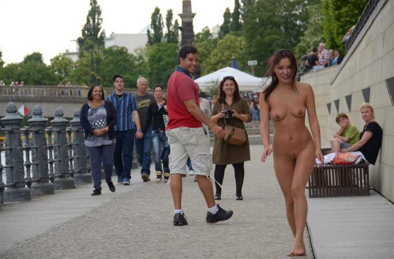 Girl undresses in public, Naked girls walk along the street, Naked girls walk down the street