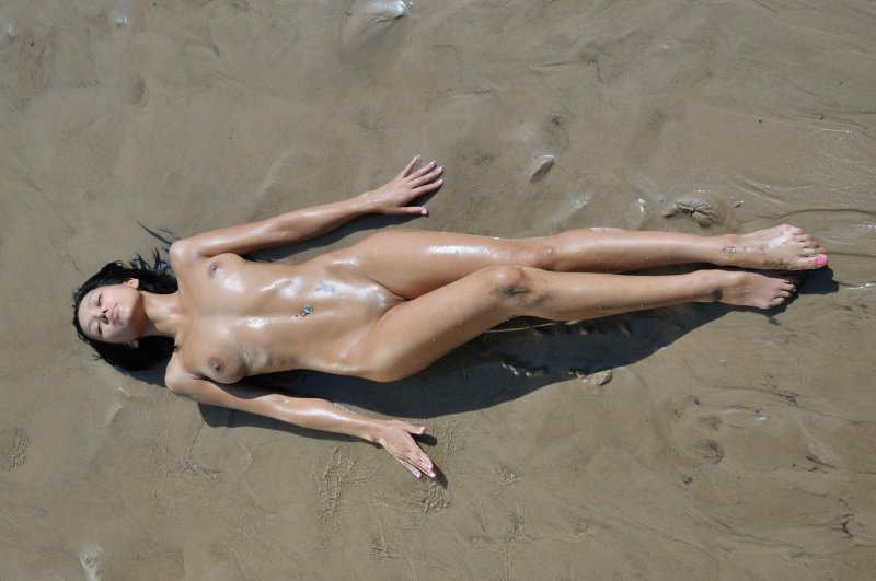 Naked girls on the beach in sand, Naked girls beach, Naked girls in the sand