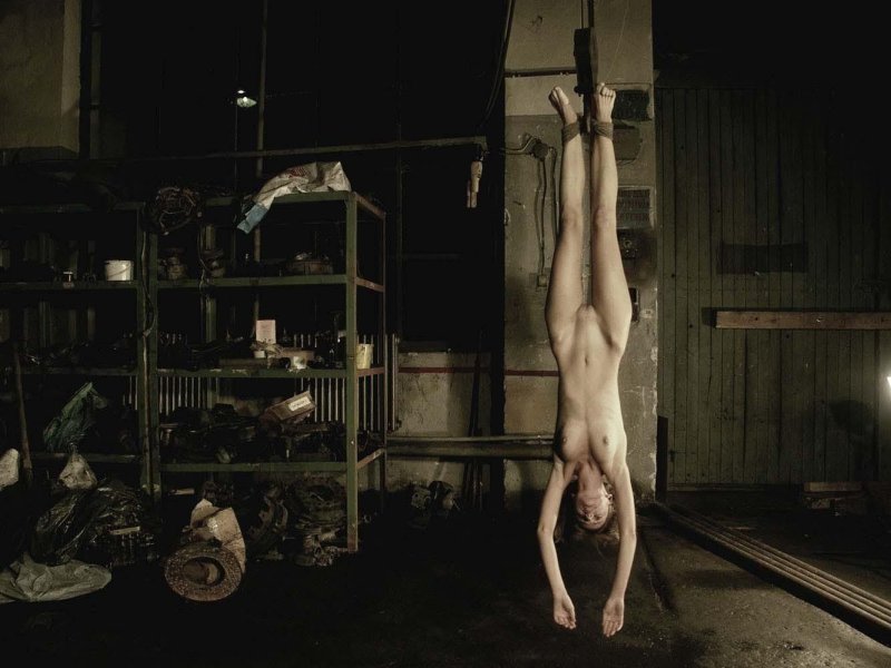 Naked women suspended by their legs, Naked women suspended by hands, Torture of naked women
